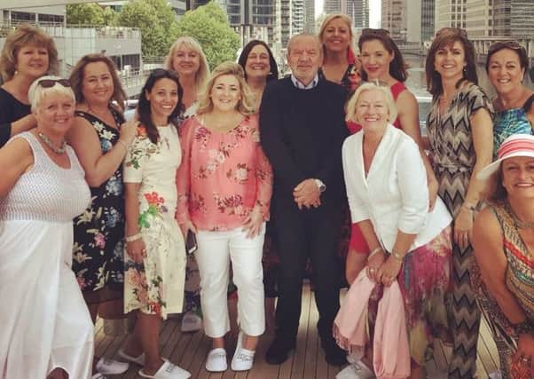 Lord Alan Sugar with Tropic Skin Care top achievers aboard the Lady A