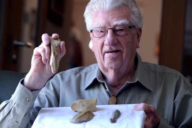 Eddie Lawrence, 88, with his finds. Picture: Kate Shemilt