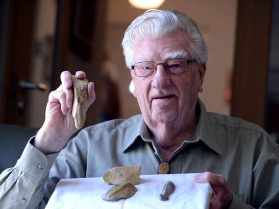 Eddie Lawrence, 88, with his finds. Picture: Kate Shemilt