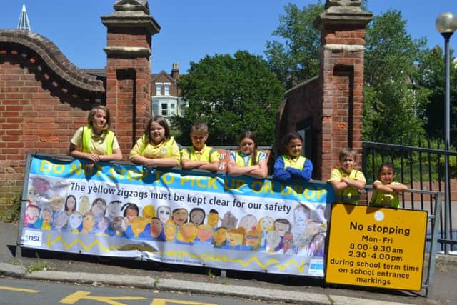 Christ Church: Pupils from Christ Church CE Primary and Nursery Academy with their banner SUS-180407-150234001