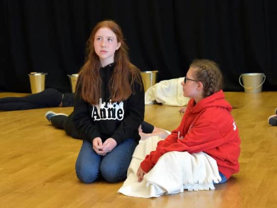 Shoreham Academy Annie played by Poppy Stewart, with orphan Molly played by Blossom Reeve