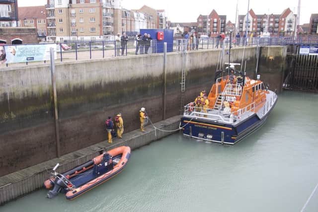 Eastbourne lifeboat arrives at Sovereign Harbour with the RIB