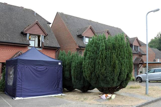 Police investigating after a woman's body was found in a house in Field End