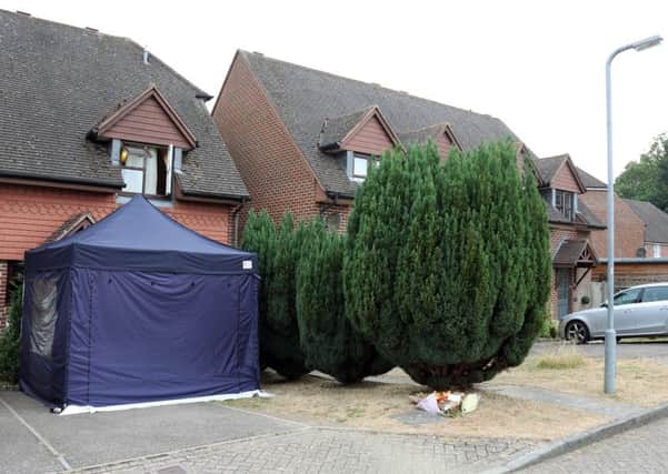 Police investigating after a woman's body was found in a house in Field End