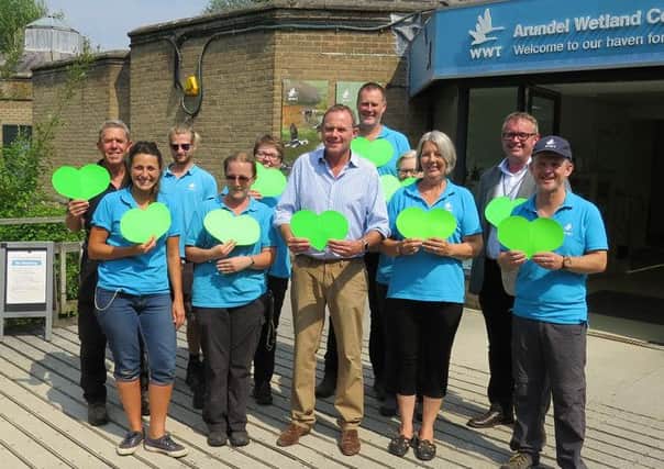 Arundel and South Downs MP Nick Herbert, centre, with staff and volunteers at Arundel Wetland Centre