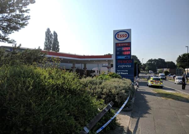 A police presence has been reported outside the Esso garage in Redkiln Way, Roffey SUS-180607-095656001