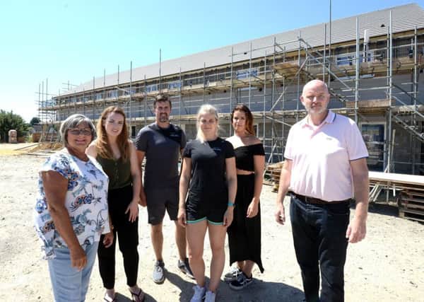 ks180350-1 Selsey Gym plan  phot kate
Kevin Byrne, right and the team that were hoping the the building could be a gym. From left:Cas Morrow, site manager, Ruth Byrne, Eden Beauty, Greg Smith and Emily Adams, Core Results, and Rachel Byrne project manager.ks180350-1 SUS-180723-190740008