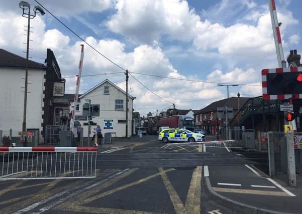 Police at the scene of the Billingshurst level crossing collision
