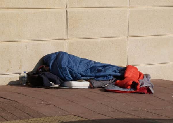 A rough sleeper in Brighton. Copyright Mike Pennington and licensed for reuse under Creative Commons Licence