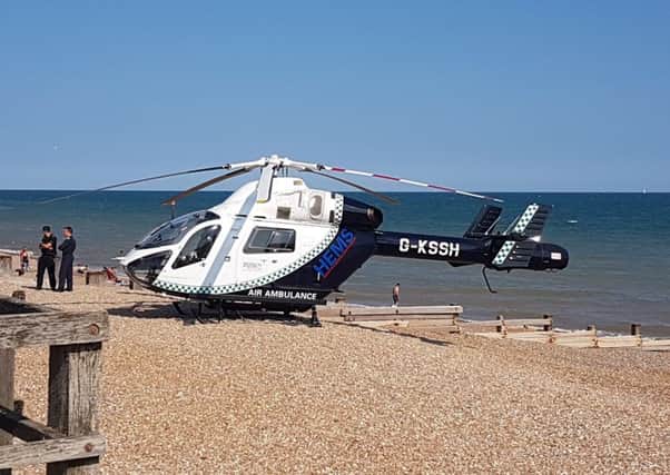The air ambulance was called to Bexhill beach on Sunday afternoon (July 8). Picture: Matt Attrell