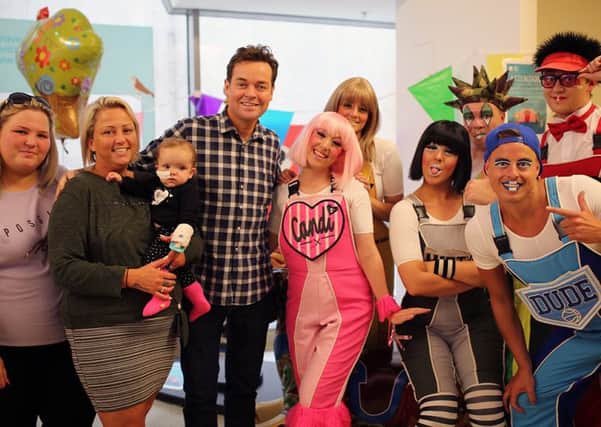 GOSH patient Tilly with Butlins Skyline Gang and Stephen Mulhern at Great Ormond Street Hospitals Summer Party