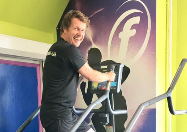 Cllr Andy Batsford trying out the new equipment at Summerfields Leisure Centre. SUS-180907-124900001