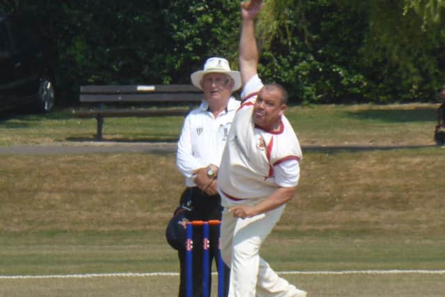 Former Hastings Priory captain Jason Finch bowling for Mayfield.