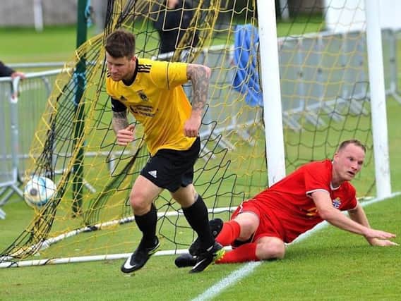 George Gaskin in action for Littlehampton last season. Picture by Stephen Goodger