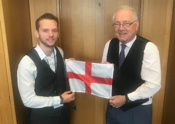 Joe Osborne and Peter Bottomley dressed in their Gareth Southgate waistcoats to support England in the World Cup yesterday