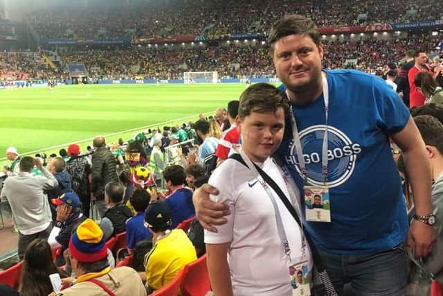 Danny and Archie Robinson in the crowd ahead of England's last 16 game with Colombia
