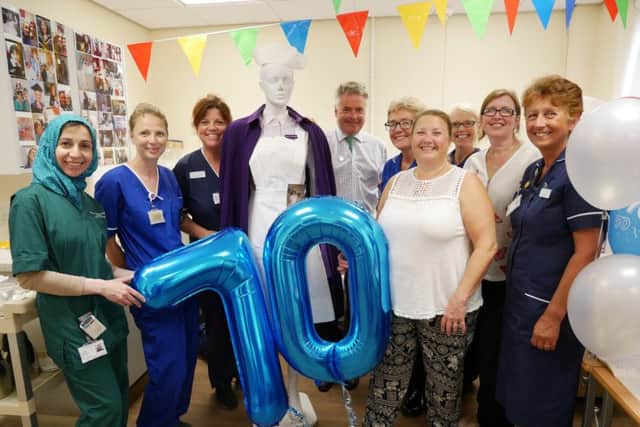 Tim Loughton with maternity staff and the old-style uniform worn by matrons