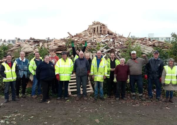 Organisers and volunteers from the Littlehampton Bonfire Society while building last year's bonfire