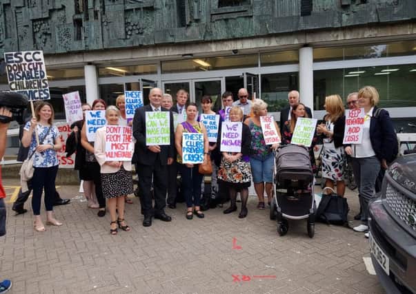 Outside County Hall, East Sussex County Council, Lewes, on Tuesday 10th July a protest was held against proposed cuts to After School Clubs for children with disabilities. Pictured with protesters are Liberal Democrat County Councillors who are opposed to these proposed cuts.