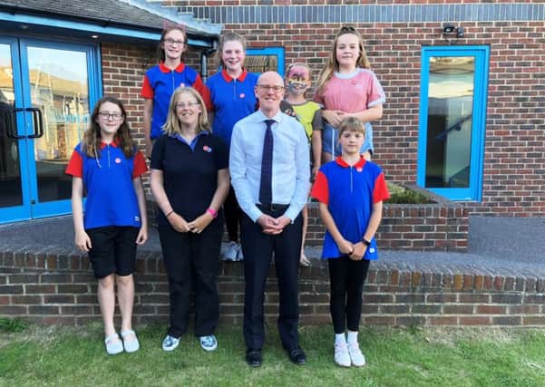Littlehampton MP Nick Gibb with 2nd Wick Guides and their leader, Lucy Buckingham