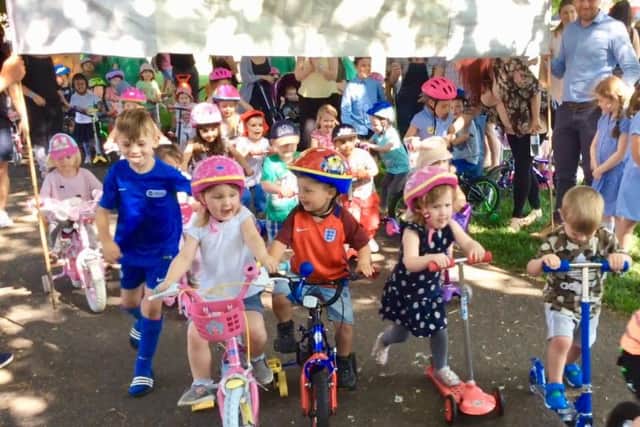 Children took to scooters and bikes for the sponsored ride around Victoria Park