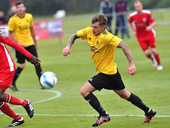 Ben Gray, in action for former club Littlehampton Town, has joined Arundel. Picture by Stephen Goodger