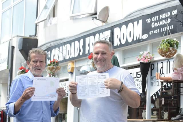 Danny Dawes (right), who runs the Bognor Regis StreetSheet scheme, pictured                                                                    with one of its directors, displaying the help sheet. Picture by Kate Shemilt.