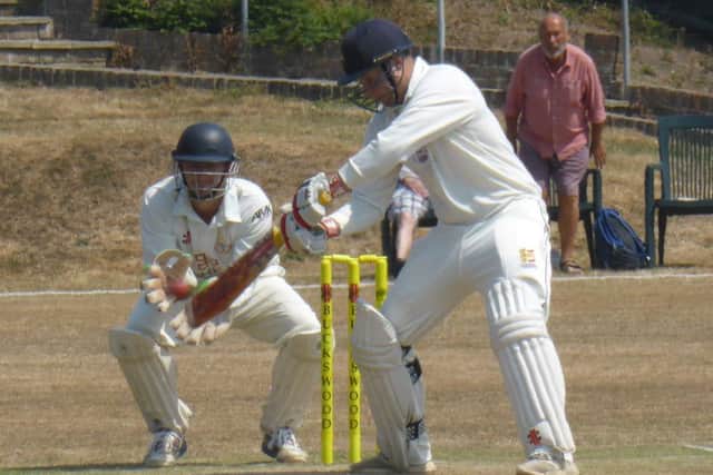 In-form Hastings Priory batsman Jake Woolley plays a cut shot against Ifield.