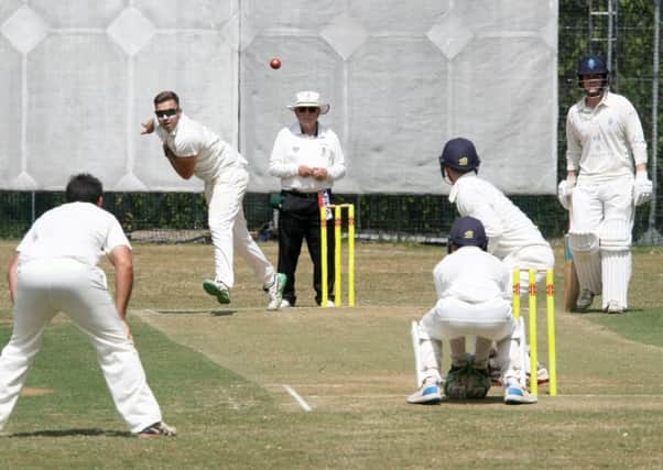 DM1872185a.jpg Cricket: Haywards Heath v Billingshurst (batting). Johnny Phelps bowling to Stuart Babrey. The other batsman is Tom Haynes. Photo by Derek Martin Photography. SUS-180714-195509008