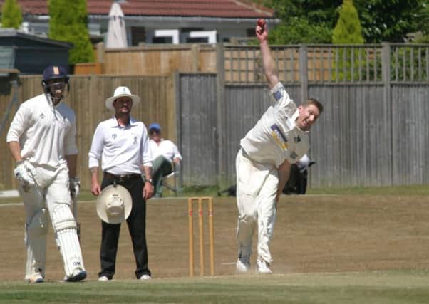 Roffey's Leigh Harrison bowling against Chingford in the ECB National Club Championship. Picture by Clive Turner