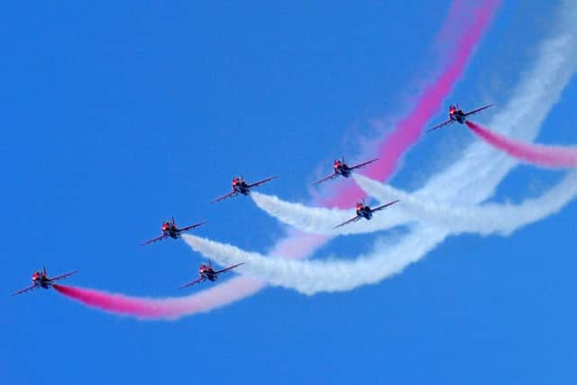 The Red Arrows over Hastings. Pictures by Tony Coombes Photography