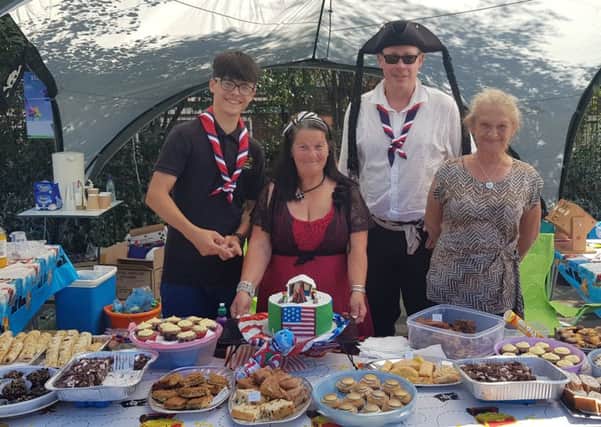 Scrumptious cakes and jolly helpers at Silverdale Summer Fair 2018 SUS-180718-135758001