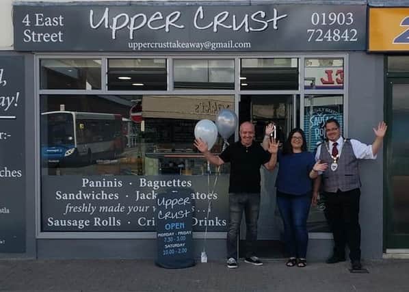 Billy with Owen and Vicky, owners of Upper Crust in East Street, at the official reopening