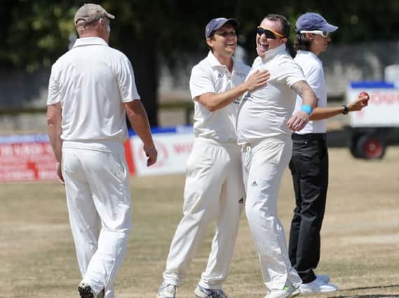 Keir McCarthy celebrates one of his three wickets for Broadwater. Picture by Stephen Goodger