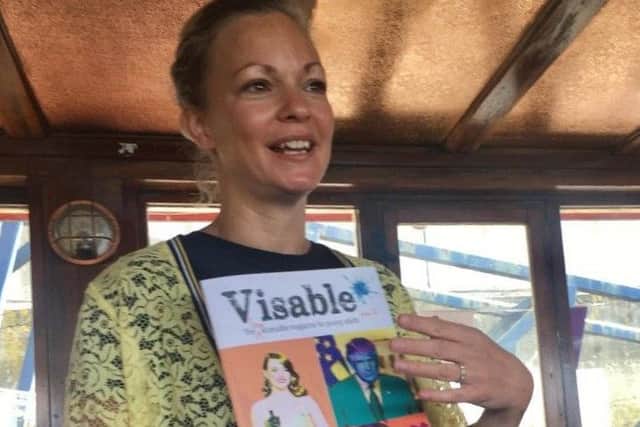 Kate Wilson with a copy of Visable Inc, the new magazine. Picture: Sophie Sheinwald