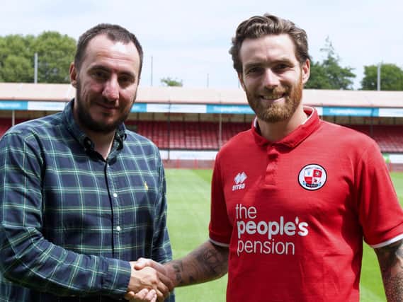 New signing Romain Vincelot with director of football Selim Gaygusuz