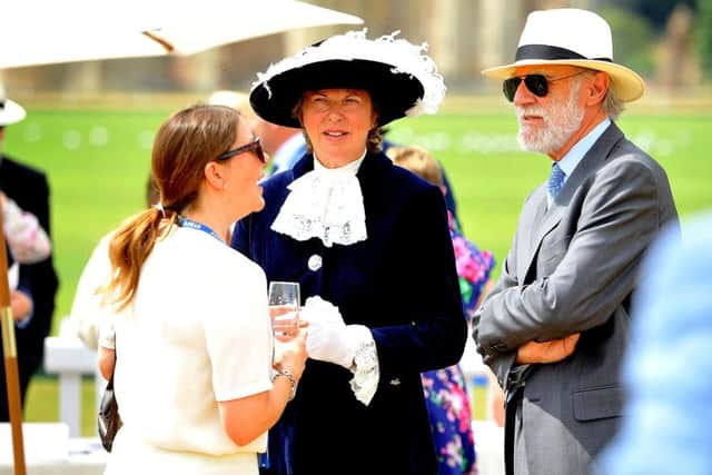 Princess Anne visiting Cowdray Park Polo Club as president of World Horse Welfare. High Sheriff
Mrs Caroline Nicholls DL and Lord Cowdray await the arrival of the princess. Pic Steve Robards Pic SR1818877 SUS-180719-161807001