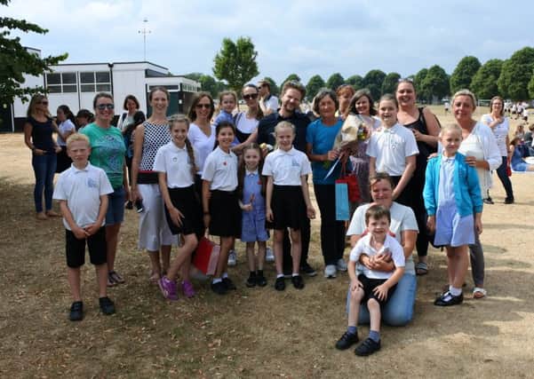 Pupils and parents gathered to bid farewell to lollipop lady Dana Gardiner
