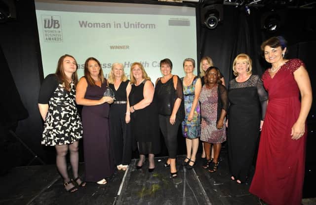 Women in Uniform winners East Sussex Healthcare NHS Trust  & (far left) sponsor Dr Aniko Lazar from First Choice Dental Surgery. SUS-180721-151542001