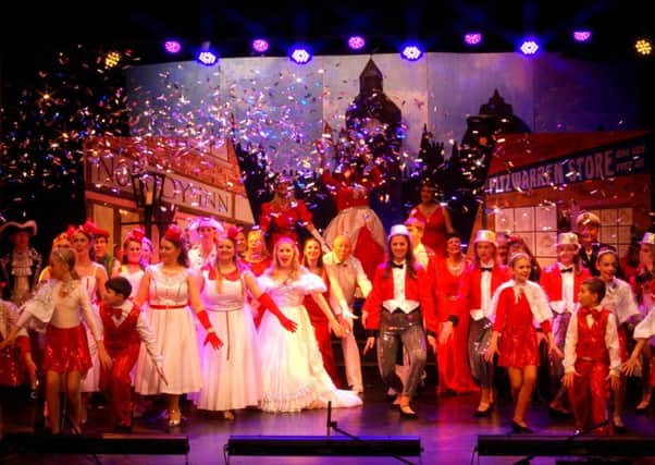 The glittering finale of Dick Whittington by the Littlehampton Music Comedy Society, which has benefitted from the council's grant aid