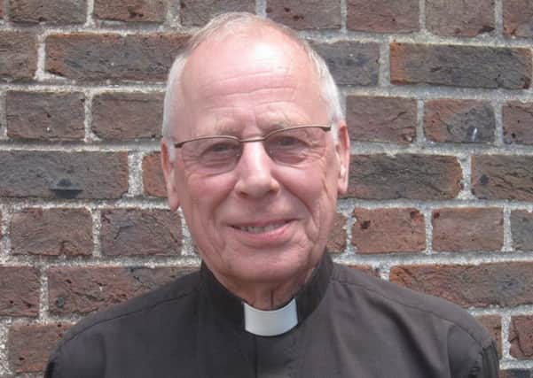 Father Roger Caswell SUS-180625-133957001