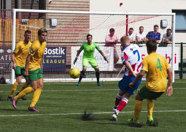 Action from Horsham's pre-season friendly against Dorking Wanderers. Picture by Tommy McMillan