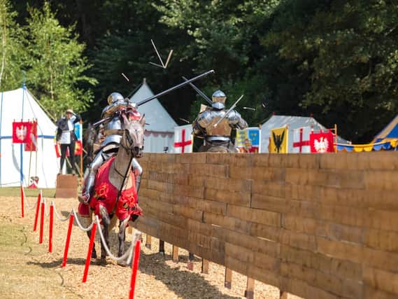 Action in the International Jousting and Medieval Tournament at Arundel Castle. Picture: Exposure Photography