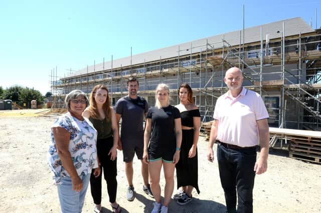 ks180350-1 Selsey Gym plan  phot kate
Kevin Byrne, right and the team that were hoping the the building could be a gym. From left:Cas Morrow, site manager, Ruth Byrne, Eden Beauty, Greg Smith and Emily Adams, Core Results, and Rachel Byrne project manager.ks180350-1 SUS-180723-190740008