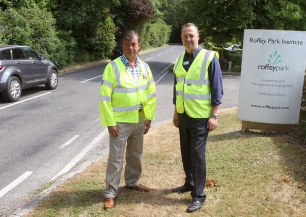DM1873630a.jpg Campaigners are calling for a 40mph speed limit in Forest Road between Horsham and Pease Pottage. Parish councillor Steve Garley, left and Nigel Dean from Roffey Park Institute. Photo by Derek Martin Photography. SUS-180724-184757008