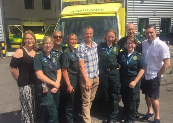 Cardiac victim Willelm Pretorius with ambulance crews who saved his life SUS-180725-153504001