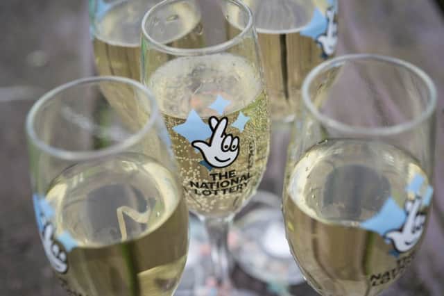 Cheers: 67 Brighton and Hove residents have celebrated million pound lottery wins since 1994