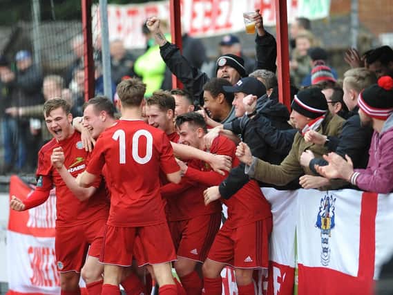 Worthing's players and fans celebrate a goal last season. Picture by Stephen Goodger