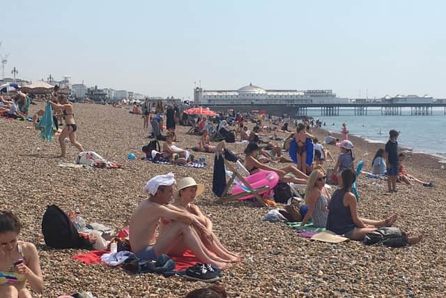 Sunseekers on Brighton beach during the heatwave