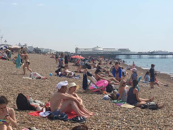 Sunseekers on Brighton beach during the heatwave